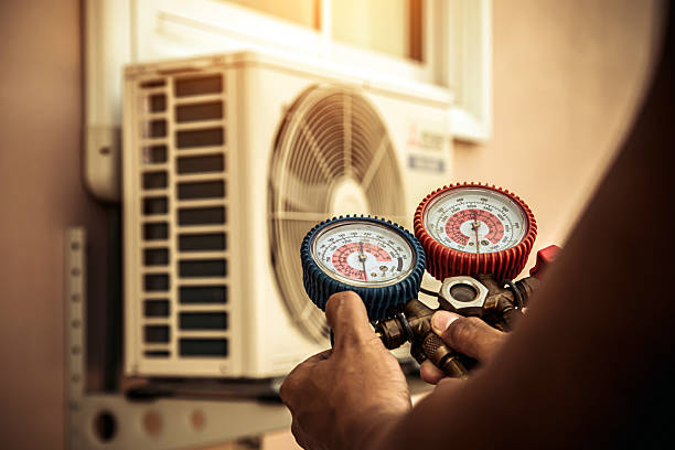 Professional Ac Installation technician working in Norwood, MA